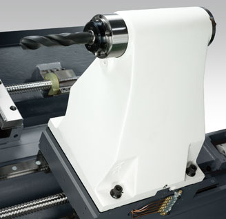 Programmable tailstock with center drill
